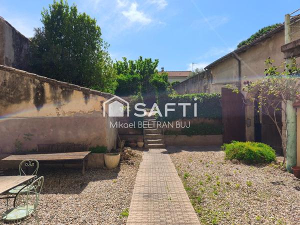 Maison de Maître avec appartement indépendant loué et garage