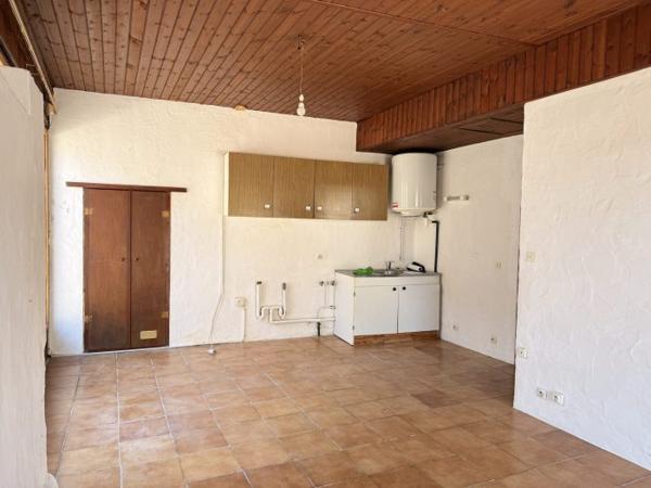 Petite maison de plain-pied avec jardin en coeur de bourg