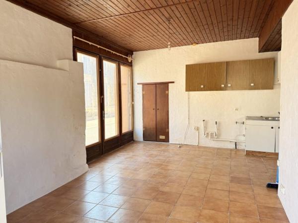Petite maison de plain-pied avec jardin en coeur de bourg