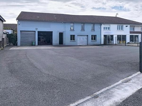 Garage automobile avec son appartement attenant