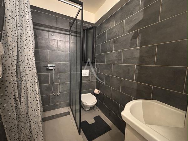 APPARTEMENT TYPE 2 AU REZ DE CHAUSSEE AVEC GARAGE ET CAVE