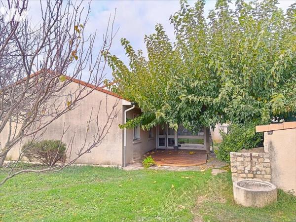 Maison de plain pied av garage, jardin et dépendances