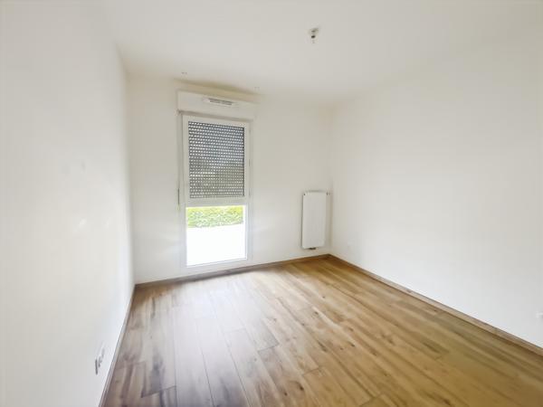 À Martignas-Sur-Jalle, appartement en location, balcon et 2 places de parking