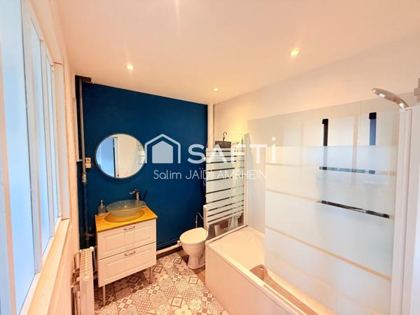 Appartement lumineux avec 2 parkings + cave