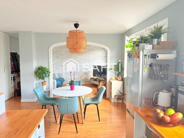 Appartement lumineux avec 2 parkings + cave