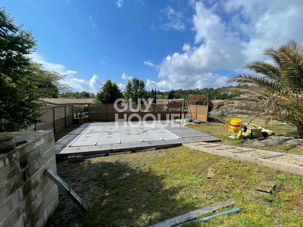 Maison familiale avec piscine sur terrain de 1165 m² à Ychoux