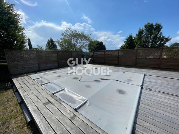 Maison familiale avec piscine sur terrain de 1165 m² à Ychoux