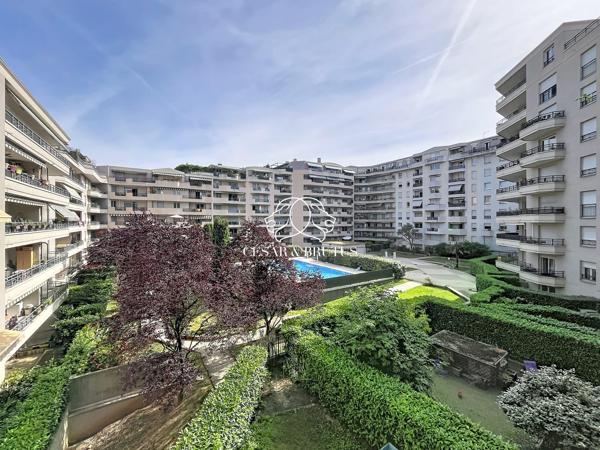 GRAND T4 EN ETAGE ELEVE AVEC BALCONS, CAVE ET GARAGE