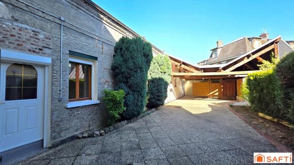 MAISON T6 de 143m² en CENTRE VILLE avec commodités de plain-pied, grande terrasse et accès véhicule