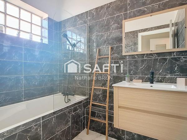 Appartement T3 de 49m² rénové, cour, stationnement