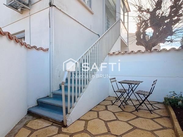 Appartement T3 de 49m² rénové, cour, stationnement