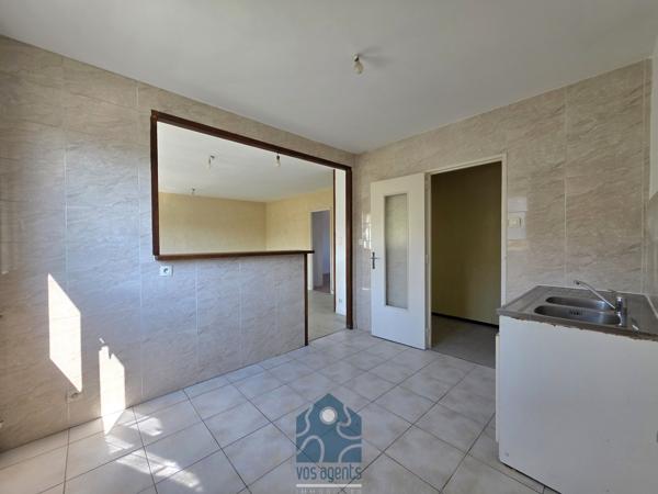 Appartement 4 pièces avec stationnement