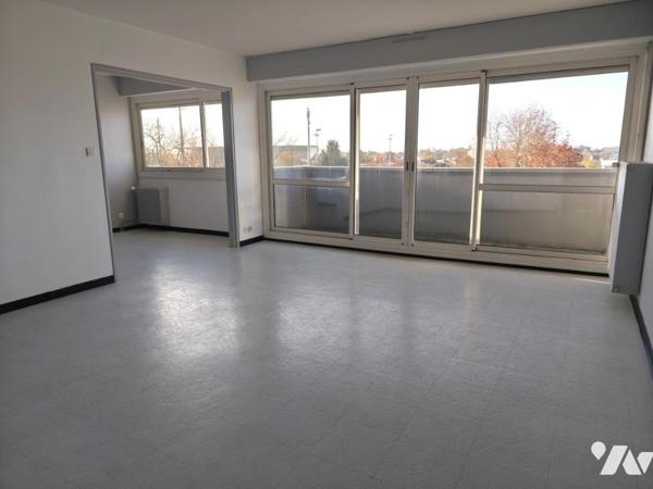 T4 avec beaux volumes et balcon