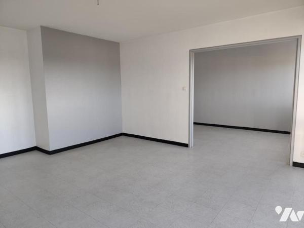 T4 avec beaux volumes et balcon