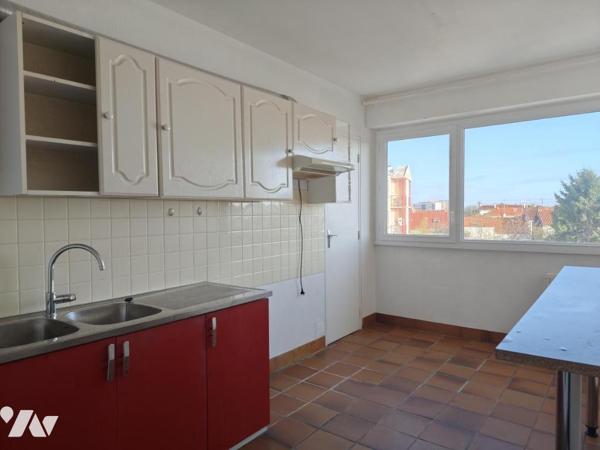 T4 avec beaux volumes et balcon