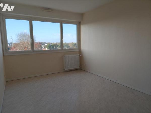 T4 avec beaux volumes et balcon