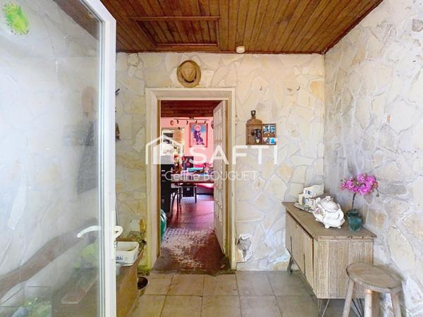 Maison à rénover avec garage et jardin