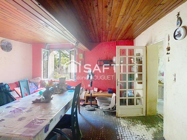 Maison à rénover avec garage et jardin