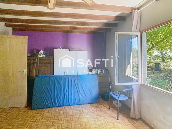 Maison à rénover avec garage et jardin