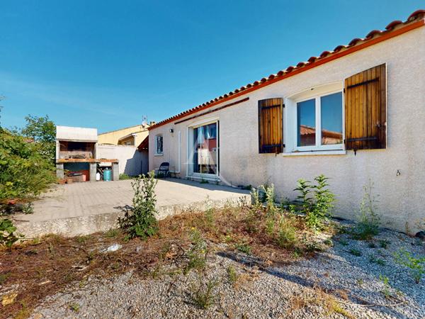 Maison 4 faces plain pied avec jardin et garage à Paraza