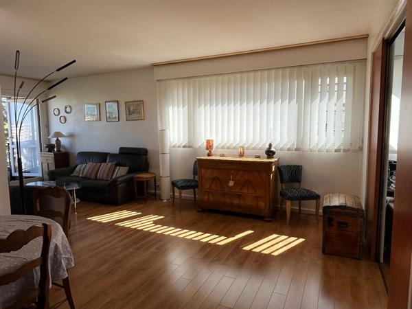 Appartement  de 111m², 3 chambres, balcon, 2 box et une cave