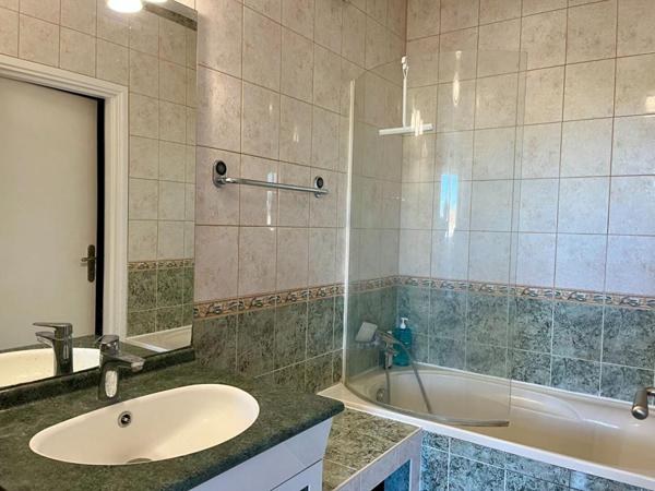 Appartement  de 111m², 3 chambres, balcon, 2 box et une cave