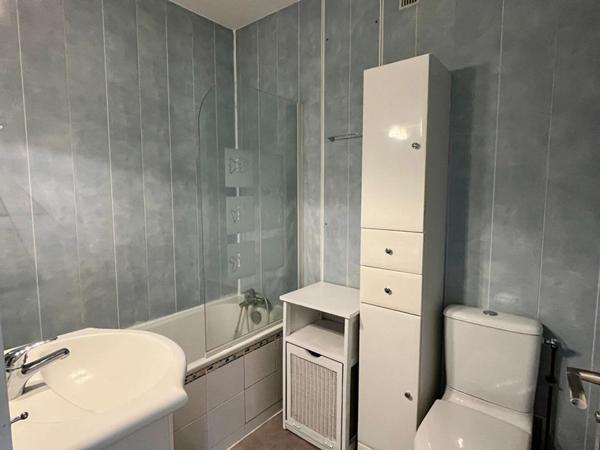 Appartement  de 111m², 3 chambres, balcon, 2 box et une cave