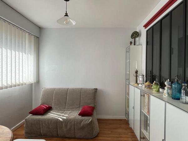 Appartement  de 111m², 3 chambres, balcon, 2 box et une cave