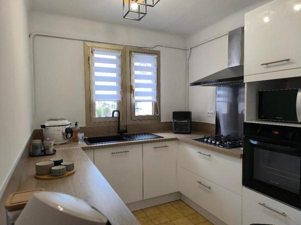 Nîmes : Centre Appartement  4 pièce(s) 77.96 m2 balcon garage