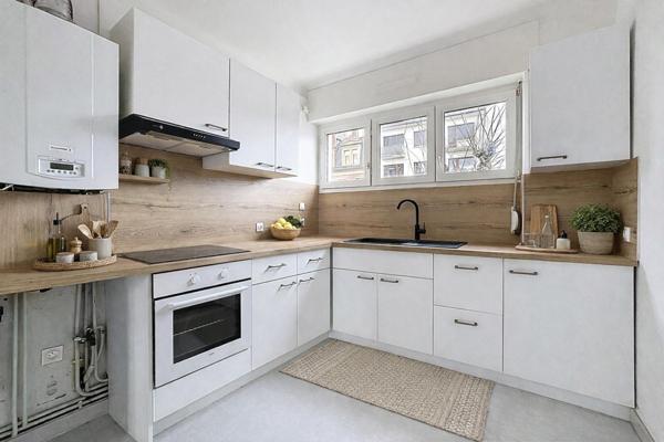 Appartement rénové avec Balcon, parking et garage