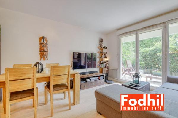 Appartement 3 pièces de 60 m ²- jardin de 30m²avec un parking et une cave.