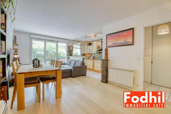 Appartement 3 pièces de 60 m ²- jardin de 30m²avec un parking et une cave.