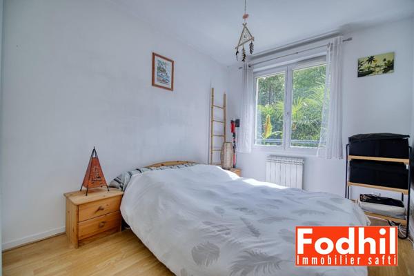 Appartement 3 pièces de 60 m ²- jardin de 30m²avec un parking et une cave.