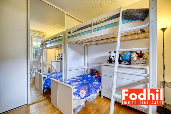 Appartement 3 pièces de 60 m ²- jardin de 30m²avec un parking et une cave.