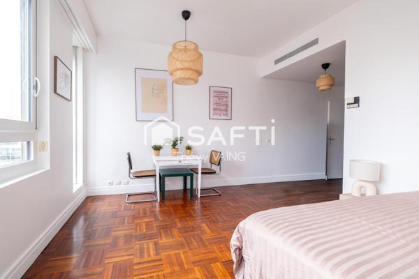 Studio rénové, vue dégagée, étage élevé, sur cour