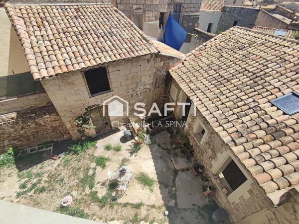 Maison de ville à fort potentiel avec dépendances