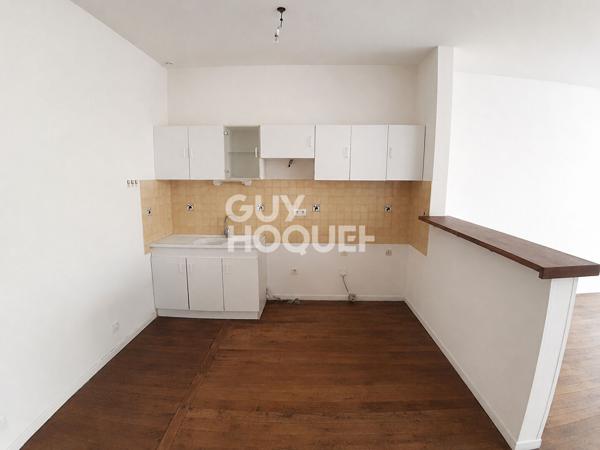 Appartement en RDC - Charme et confort au coeur de la ville