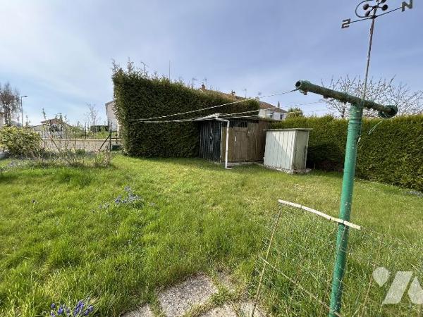 maison semi mitoyenne sur sous-sol avec jardin