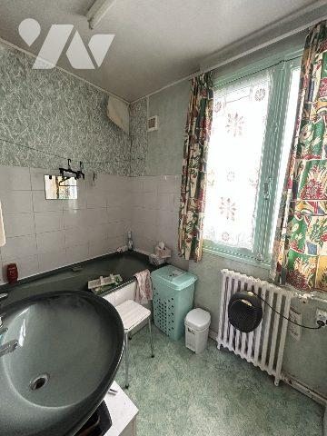 maison semi mitoyenne sur sous-sol avec jardin