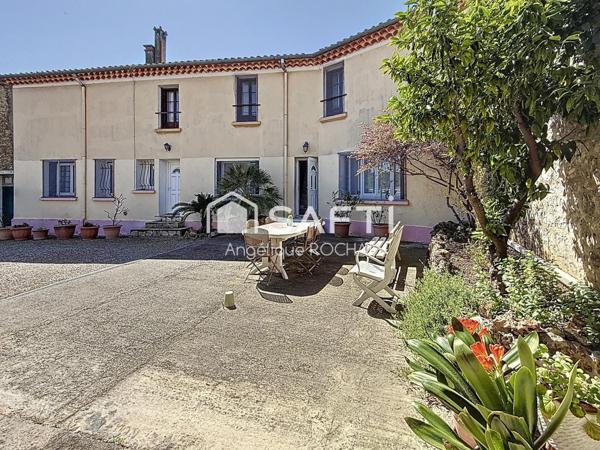 Grande Vigneronne avec 5 chambres un grand garage de + 100m2 et une piscine au centre de Magalas