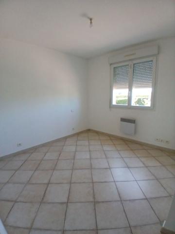 Maison T4 mitoyenne avec jardin et garage