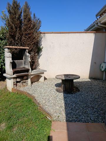 Maison T4 mitoyenne avec jardin et garage