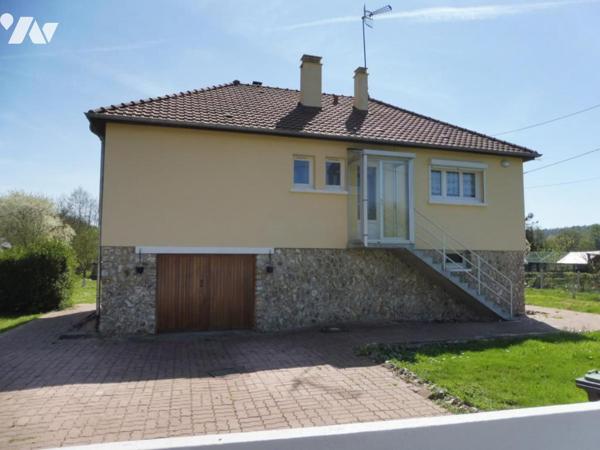 Pavillon à usage d'habitation édifié sur sous-sol total, couvert en tuiles mécaniques