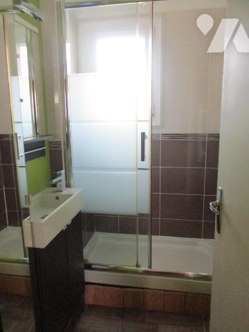 Pavillon à usage d'habitation édifié sur sous-sol total, couvert en tuiles mécaniques