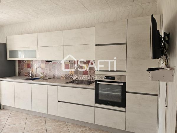 Maison mitoyenne d'un coté,rénovée,4 chambres...