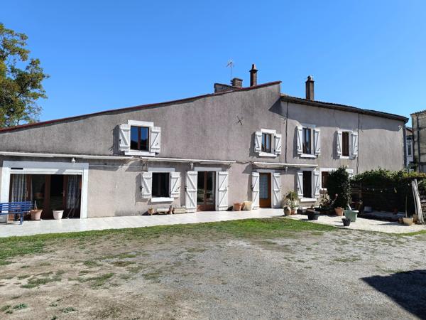 Grande maison de ville avec 5/6 chambres et encore du potentiel!