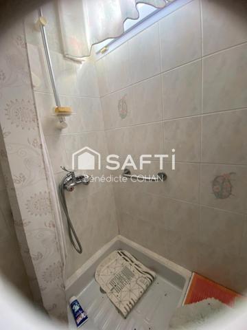 Maison de 45 m2, combles à aménager et terrain clos