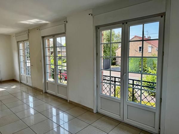 Maison individuelle à vendre avec jardin, garage et cave à Marcq-en-Baroeul
