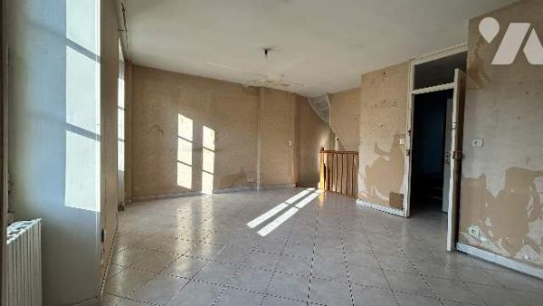 Immeuble mixte commercial et habitation
