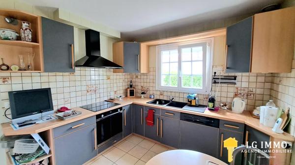 Belle maison de ville , vue dégagée 200m des commerces .